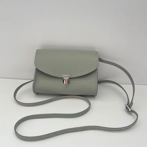 Like new The Cambridge Satchel Company “the pushlock” purse in light gray
